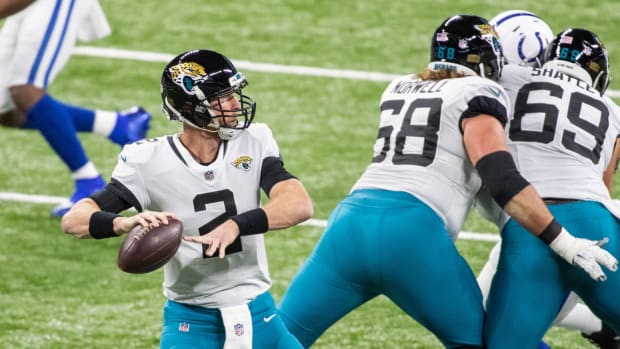 Jan 3, 2021; Indianapolis, Indiana, USA; Jacksonville Jaguars quarterback Mike Glennon (2) drops back to pass the ball in the first half against the Indianapolis Colts at Lucas Oil Stadium.